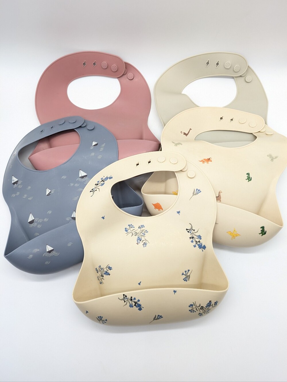 Mushie Tan Pink Blue Silicone Adjustable Baby Bibs - Set Of 5